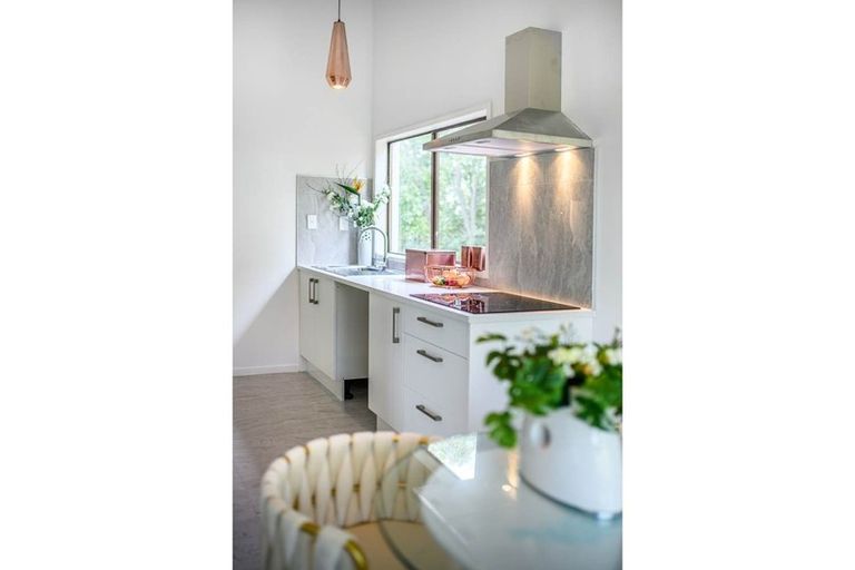 Photo of property in 1/13 Hollyhock Place, Browns Bay, Auckland, 0630