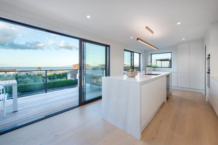Photo of property in 2/67 Castor Bay Road, Castor Bay, Auckland, 0620